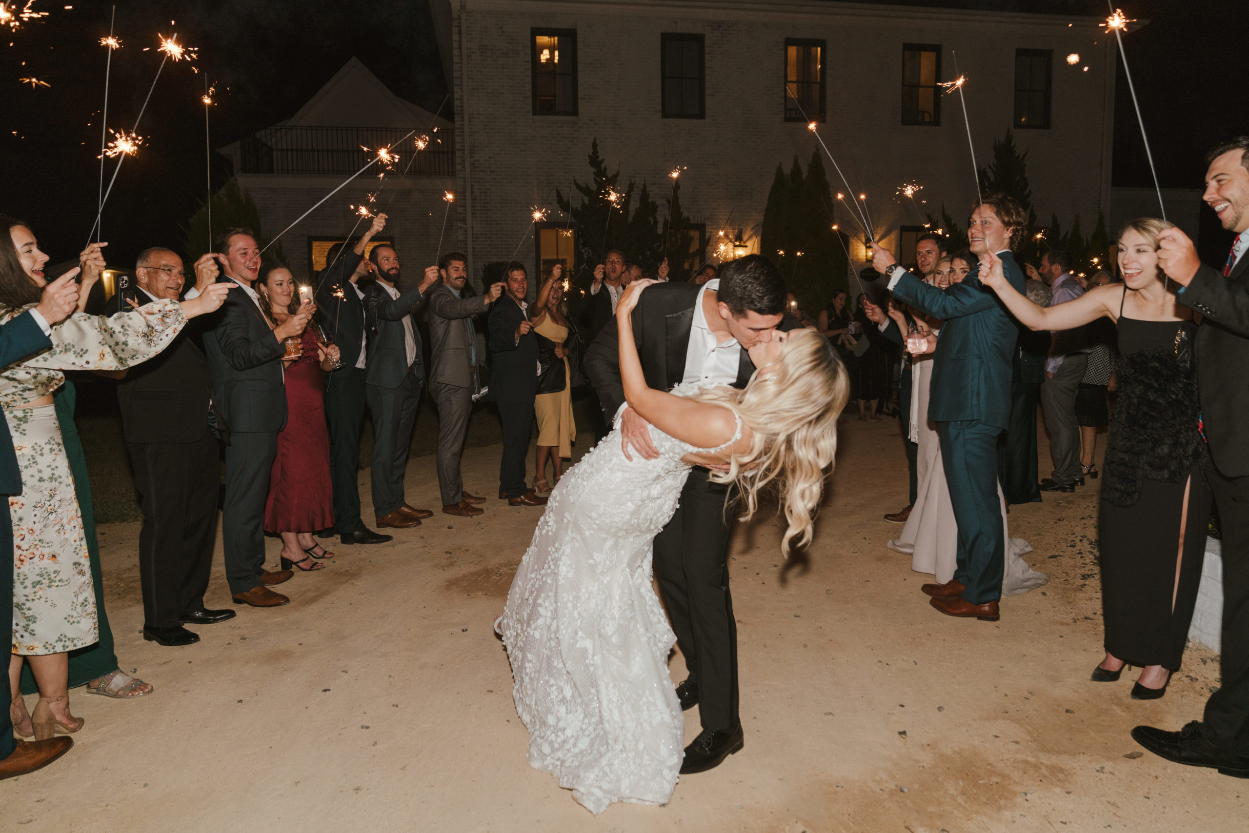 bride and groom at sparkler exit