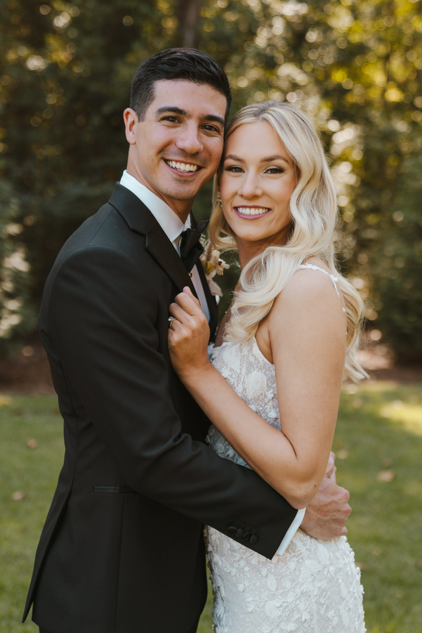 bride and groom smiling