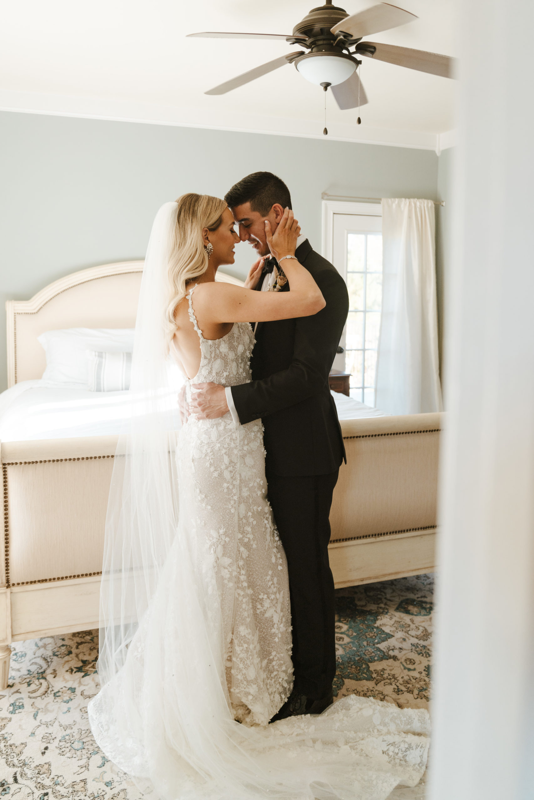 bride and groom hugging